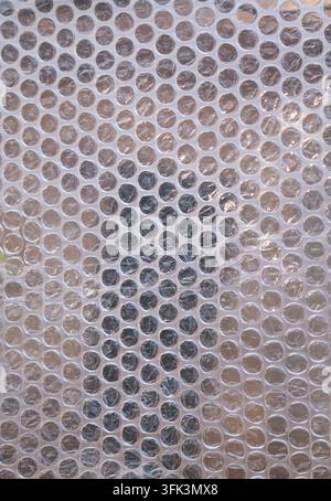 Transparent Bubble Wrap Texture Background with Circular Air Cushion Pattern Stock Photo