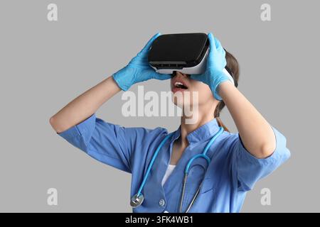 Medical training and virtual reality, doctor using vr headset for surgical simulation and healthcare innovation in a clinical environment Stock Photo