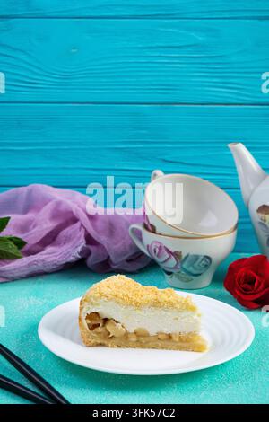 Freshly baked apple pie with smooth souffle cream topping. Baked dessert with apples and a light creamy texture Stock Photo