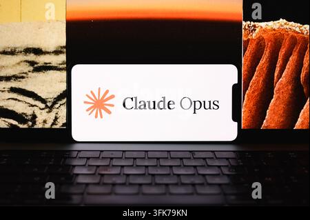 Paris, France - 23 September 2026 : Claude Opus branding displayed on a smartphone placed on a laptop keyboard. Stock Photo