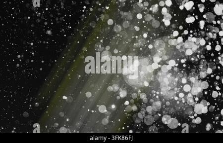 A mesmerizing abstract background featuring glowing white bokeh particles and soft light streaks against a deep, dark textured backdrop, perfect for c Stock Photo