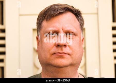 Large portrait of a Caucasian man aged 45-50 years. Stock Photo