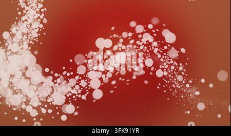 Abstract background texture with white light sparkles and dots, set against a vibrant red backdrop. Stock Photo