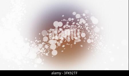 Abstract white bokeh particles and sparkling dust forming a wave over a colorful gradient spot, isolated on pure white background. Stock Photo