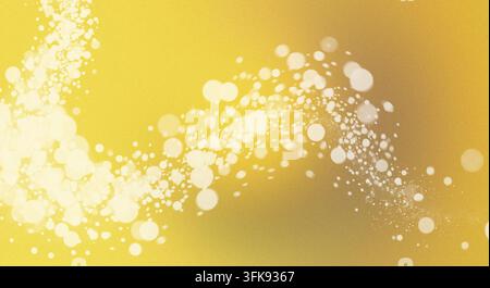An abstract gold background featuring a sweeping wave of brilliant white bokeh lights and sparkling stardust particles. Stock Photo