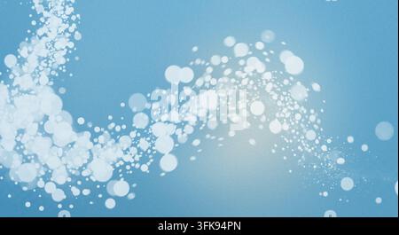 Abstract blue textured background featuring a swirling wave of white bokeh and glitter particles. Stock Photo