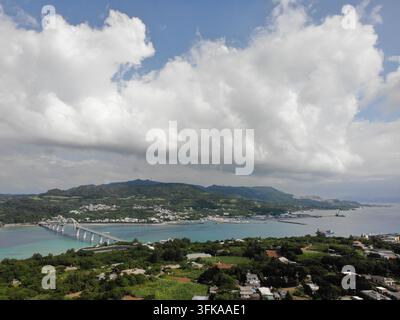 Aerial view of the lush landscape of Sesoko Island, featuring dense ...