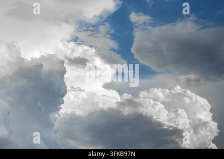 Clear sky emerging after dark clouds disperse, nature background Stock Photo