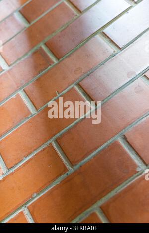 Close-up of diagonal texture on red brick pavement at Red Brick Art Museum Stock Photo