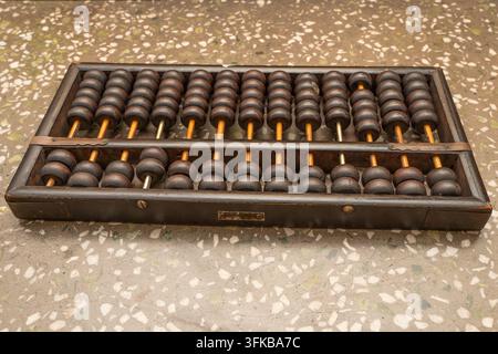 Close-up of a vintage wooden abacus on display Stock Photo