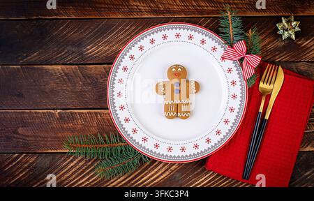 Christmas table setting for celebration design. Holiday celebration.  Kitchen dining table. Winter holiday season. Food decor. Top view, Stock Photo