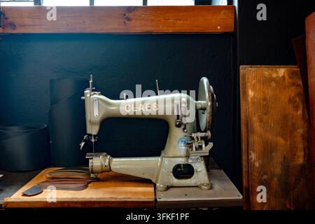 Vintage Claes sewing machine used for leatherworking at an artisan shop inside Hala Targowa. Stock Photo