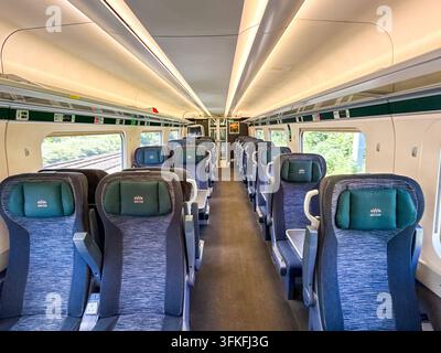 En route Cardiff to London, UK - 19 June 2026: Interior view of seating in an empty first class carriage on a GWR Great Western Railways train Stock Photo