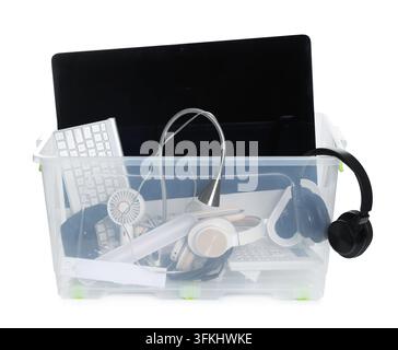 Plastic container with different broken household appliances for recycling isolated on white Stock Photo