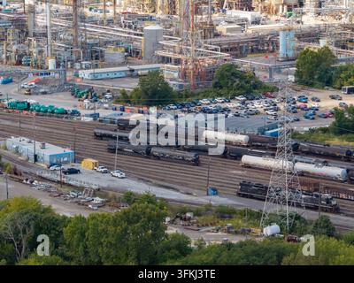 Telephoto aerial shot of heavy freight trains at industrial facility Stock Photo