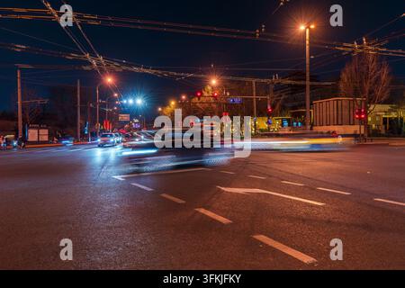 Long exposure photography of busy city traffic at night on Wusi Street, Beijing Stock Photo