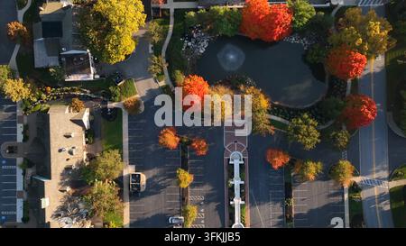 Work from home hybrid remote employee theme. Top down aerial of empty parking lot of corporate office building, East Lampeter Township, Pennsylvania. Stock Photo