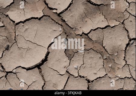Cracks and textures in dried earth Stock Photo