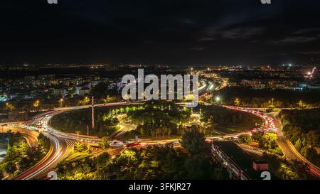 Night view of Xiguan Roundabout in Changping, Beijing, with traffic on the circular interchange Stock Photo
