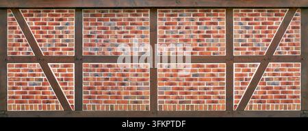 Half-timbered panorama - brown beams filled with red patterned bricks Stock Photo