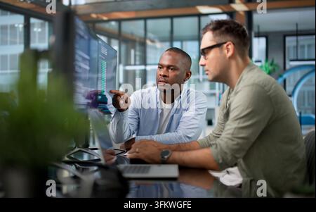 Software Developer Collaborates With Team Using Cloud-based Coding Workspace. Stock Photo