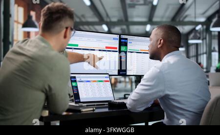 Healthcare Manager Reviews Software Dashboard Carefully To Prevent Medical Billing Denials. Stock Photo