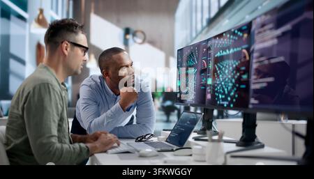 Data Scientist Carefully Analyzes AI Models Using Laptop And Software Tools. Stock Photo