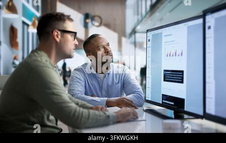 Software Developer Analyzes Artificial Intelligence Plan While Collaborating With Team. Stock Photo