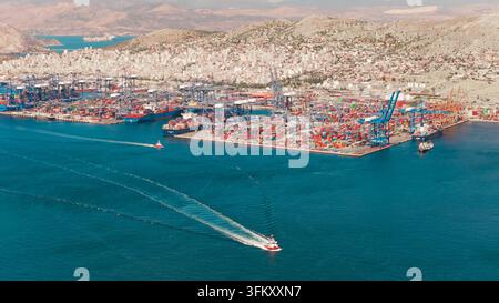 Aerial view of a busy shipyard with numerous cargo ships and boats ...