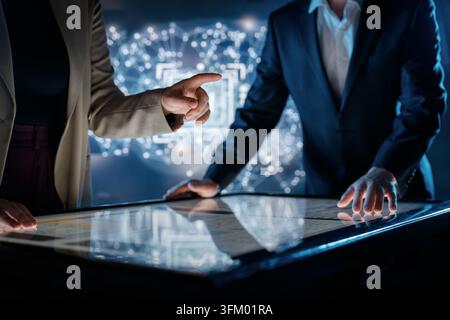 Energetic, forward-thinking professionals work together at a high-tech ...