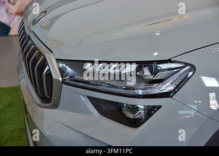 Skoda Kamiq car headlight and front grille detail on a new grey vehicle Stock Photo