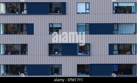 Aerial view of a modern apartment complex with colorful facades, flat ...