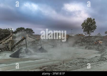 Aggregate processing plant with sorting conveyors in a mining quarry Stock Photo