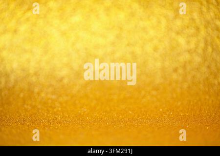 Elegant Glowing Scene. Luxurious Background With Warm Shimmer. Shimmering Gold Setting With Subtle Glow Textures. Opulent Radiant Backdrop Showcasing Stock Photo