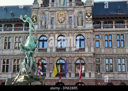 Antwerp, Belgium - March 3, 2023: Brabo fountain statue standing in front of the City Hall, highlighting European city travel, culture, and architectu Stock Photo