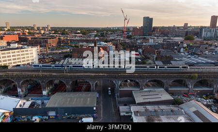 Aerial view of Bordesley Viaduct and active railway tracks over Digbeth near Birmingham Moor Street station at evening, Birmingham, UK Stock Photo