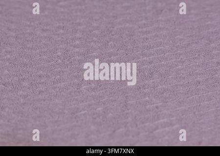 Embossed Purple expanded foam Surface with Repeating Texture Macro Stock Photo
