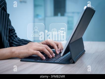 Business professional uses tablet with password, fingerprint and mobile security icons. Multi-factor authentication, secure login, digital identity ve Stock Photo
