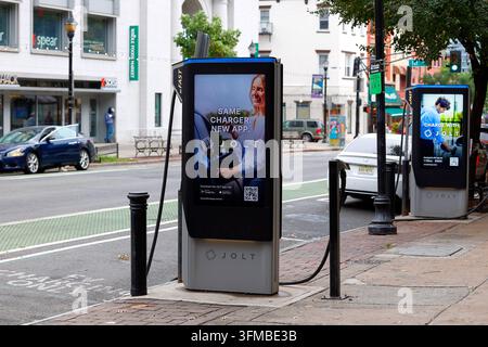 A curbside Jolt DC Fast electric car charging station in Hoboken, New Jersey. The app-based charger handles the conversion from AC to DC allowing a hi Stock Photo