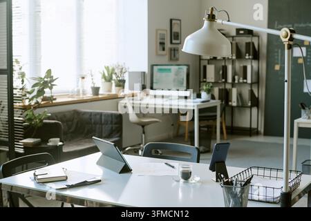 Modern Empty Coworking Space in Bright Open Office Interior Stock Photo