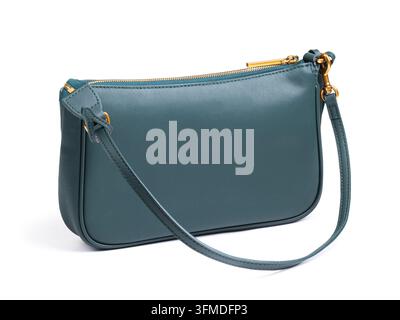 Women's dark teal green leather crossbody bag with gold hardware isolated on white background, studio shot Stock Photo