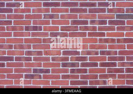 Background from a wall of clean red bricks Stock Photo