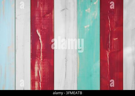 Colorful painted holzzaun background with vertical wooden boards or panels Stock Photo