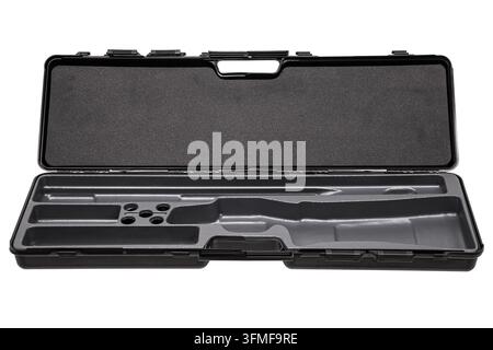 Open empty black hard rifle case with molded foam lining isolated on white background. Stock Photo