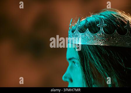 Side View of Woman Wearing Crown for Historical Fantasy Theater Stock Photo