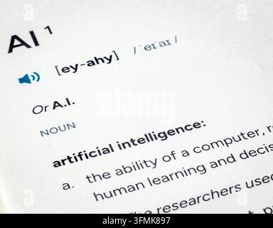 Dictionary entry and definition for term AI on paper Stock Photo