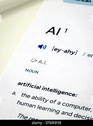 Dictionary entry and definition for term AI on paper Stock Photo