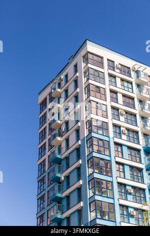 Low angle view of a modern multi-story residential building facade ...