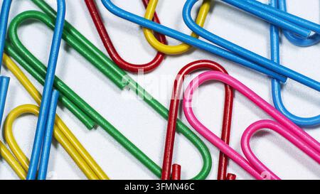 Close-up of some assorted colorful paper clips isolated on white background Stock Photo