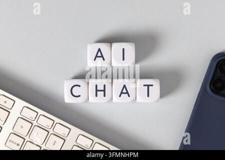 AI chat text on white cubes Stock Photo